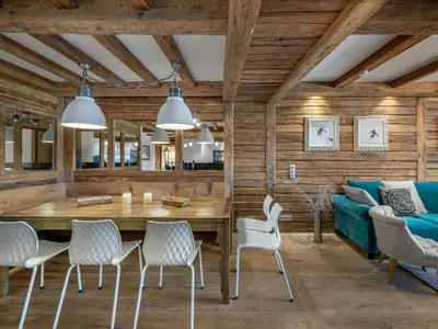 Coin salon dans l'établissement Appartement Centre Val d'Isère - Sauna, Parking, WiFi - FR-1-567-26