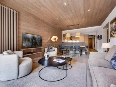 Coin salon dans l'établissement Bel appartement 4 pièces avec terrasse et parking, à 350m du centre de Val d'Isère - FR-1-567-40