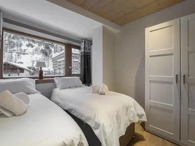Un ou plusieurs lits dans un hébergement de l'établissement Duplex rénové avec parking, proche centre et remontées, navette et bus à deux pas - FR-1-567-41