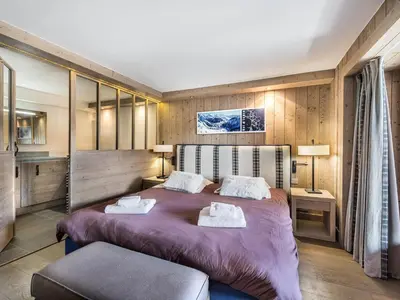 Un ou plusieurs lits dans un hébergement de l'établissement Appartement de standing avec balcon en plein centre, près des pistes - 4 chambres, 8 personnes - FR-1-567-49