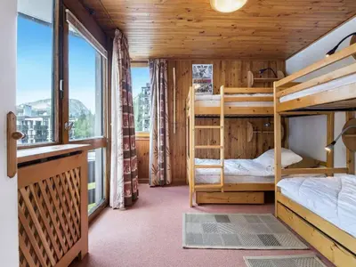 Un ou plusieurs lits dans un hébergement de l'établissement Appartement au centre de Val d'Isère, 3 pièces, 6 pers., avec WiFi - FR-1-567-60