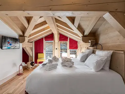 Un ou plusieurs lits dans un hébergement de l'établissement Chalet spacieux près des pistes avec sauna et WiFi, animaux admis - FR-1-567-69