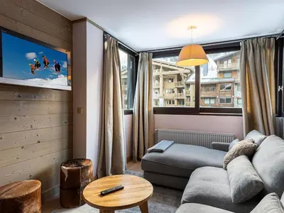 Coin salon dans l'établissement Duplex moderne à 100m des pistes, WIFI, casier à skis - FR-1-567-66