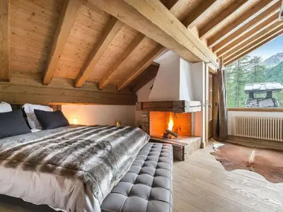 Un ou plusieurs lits dans un hébergement de l'établissement Chalet de luxe à Val-d'Isère avec accès direct aux pistes, 5 chambres, parking - FR-1-567-64
