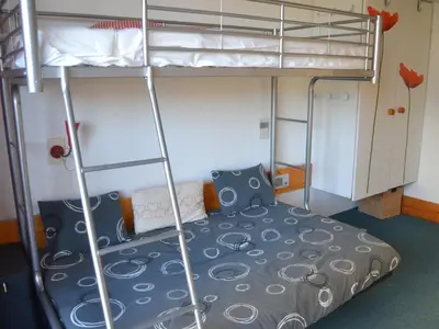 Un ou plusieurs lits dans un hébergement de l'établissement Studio cosy pour 3 aux Arcs 1800, proche pistes, avec balcon et TV - FR-1-411-681