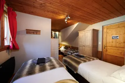 Un ou plusieurs lits dans un hébergement de l'établissement Chalet HERRISSON Peisey- Vallandry - Domaine Paradiski