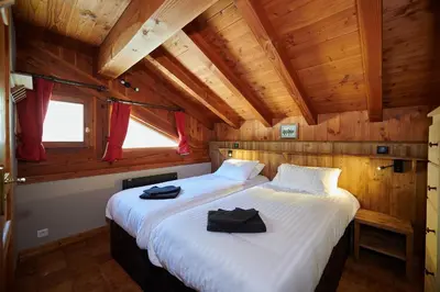 Un ou plusieurs lits dans un hébergement de l'établissement Chalet HERRISSON Peisey- Vallandry - Domaine Paradiski