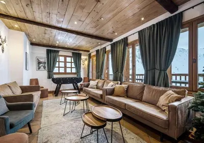 Coin salon dans l'établissement Chalet Charline