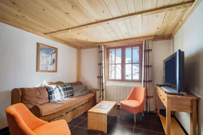Télévision ou salle de divertissement dans l'établissement Appartement Petite Charline