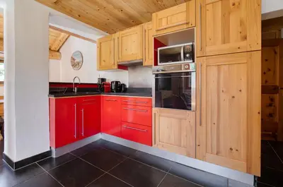 Cuisine ou kitchenette dans l'établissement Appartement Petite Charline