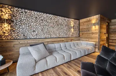 Coin salon dans l'établissement Chalet Eden Roc