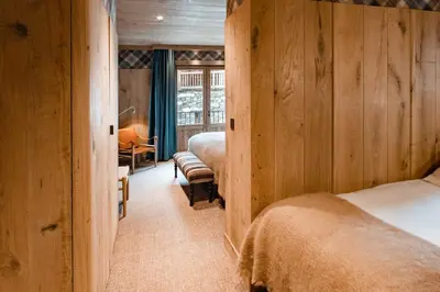 Un ou plusieurs lits dans un hébergement de l'établissement Chalets LA MOURRA