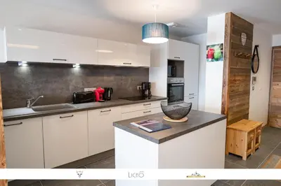 Cuisine ou kitchenette dans l'établissement MARMOTTE 003 - Superbe T4 aux pieds des pistes