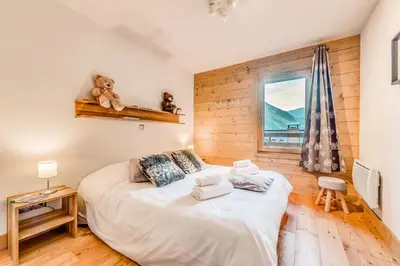 Un ou plusieurs lits dans un hébergement de l'établissement Résidence Les Balcons EtoilÉs - Appartement 4 au pied des pistes MAE-5533