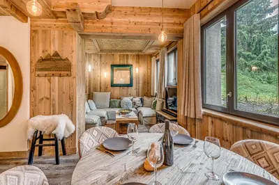 Coin salon dans l'établissement Appartement FORNET à l'Hôtel LE VAL D'ISERE