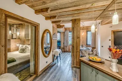 Un ou plusieurs lits dans un hébergement de l'établissement Appartement FORNET à l'Hôtel LE VAL D'ISERE