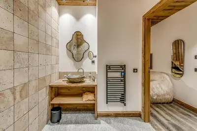 Coin salon dans l'établissement Appartement FORNET à l'Hôtel LE VAL D'ISERE