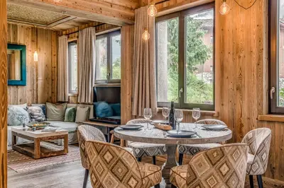 Coin salon dans l'établissement Appartement FORNET à l'Hôtel LE VAL D'ISERE