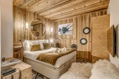 Un ou plusieurs lits dans un hébergement de l'établissement Appartement FORNET à l'Hôtel LE VAL D'ISERE