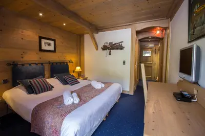 Télévision ou salle de divertissement dans l'établissement Chalet Hotel L’Ecrin