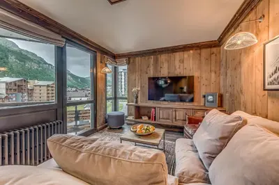 Télévision ou salle de divertissement dans l'établissement Appartement CHEVRIL à l'Hôtel LE VAL D'ISERE