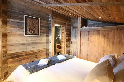 Un ou plusieurs lits dans un hébergement de l'établissement MARMOTTE 203 - Magnifique duplex aux pieds des pistes