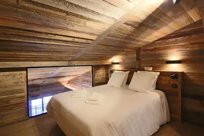 Un ou plusieurs lits dans un hébergement de l'établissement MARMOTTE 203 - Magnifique duplex aux pieds des pistes