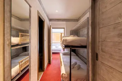 Un ou plusieurs lits dans un hébergement de l'établissement Hôtel L'Aiguille Percée