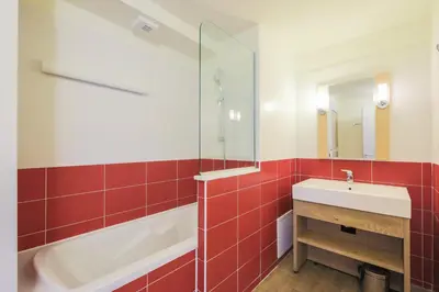 Salle de bains dans l'établissement Residence Les Gemeaux - maeva Home