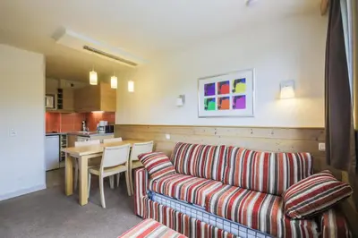 Cuisine ou kitchenette dans l'établissement Residence Les Gemeaux - maeva Home