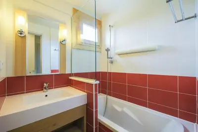 Salle de bains dans l'établissement Residence Les Gemeaux - maeva Home