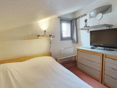 Un ou plusieurs lits dans un hébergement de l'établissement Duplex 3 pièces pour 6 pers, skis aux pieds à Val d'Isère - FR-1-411-682