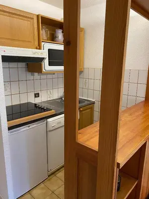 Cuisine ou kitchenette dans l'établissement Parenthèse à la montagne