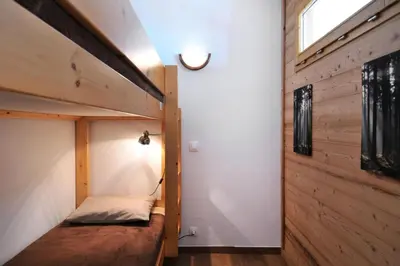 Un ou plusieurs lits dans un hébergement de l'établissement Résidence Agate - Studio divisible lumieux et chaleureux · Accès direct aux pistes · Vue pistes MAE-2635