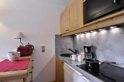 Cuisine ou kitchenette dans l'établissement Résidence Onyx - Appartement rénové et tout confort · Accès direct aux pistes · Vue pistes MAE-3458