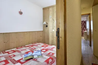 Un ou plusieurs lits dans un hébergement de l'établissement Résidence Themis - Magnifique appartement · Skis aux pieds · Vue pistes · Casier à skis MAE-3485