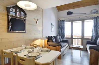 Coin salon dans l'établissement Résidence Licorne - Appartement rénové · Accès direct aux pistes · Vue pistes · Balcon MAE-3497