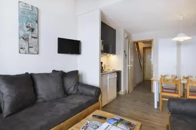 Coin salon dans l'établissement Résidence Licorne - Appartement rénové · Accès direct aux pistes · Vue pistes · Balcon MAE-3497
