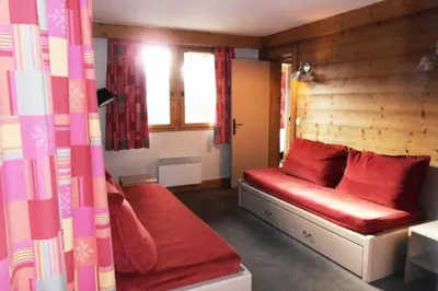 Coin salon dans l'établissement Résidence Nereides - Appartement agréable · Accès direct aux pistes · Vue pistes · Balcon MAE-3564