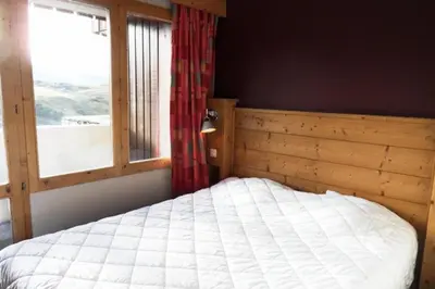Un ou plusieurs lits dans un hébergement de l'établissement Résidence Nereides - Appartement agréable · Accès direct aux pistes · Vue pistes · Balcon MAE-3564