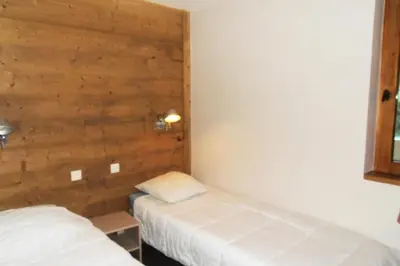 Un ou plusieurs lits dans un hébergement de l'établissement Résidence Nereides - Appartement agréable · Accès direct aux pistes · Vue pistes · Balcon MAE-3564