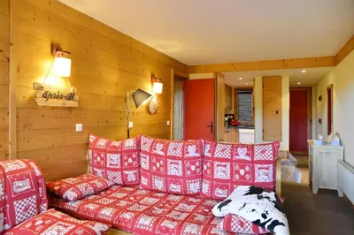 Un ou plusieurs lits dans un hébergement de l'établissement Résidence Nereides - Appartement chaleureux · Accès direct aux pistes · Casier à skis · Vue pistes MAE-3567