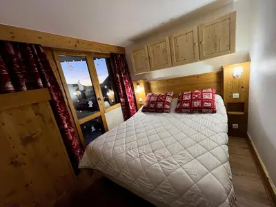 Un ou plusieurs lits dans un hébergement de l'établissement Résidence Nereides - Appartement chaleureux · Accès direct aux pistes · Casier à skis · Vue pistes MAE-3567