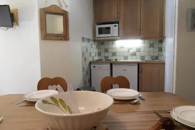 Cuisine ou kitchenette dans l'établissement Résidence Callisto - Appartement tout confort · Skis aux pieds · Vue pistes · Balcon MAE-3570
