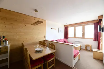 Coin salon dans l'établissement Résidence Licorne - Appartement tout confort · Skis aux pieds · Vue pistes · Casier à skis MAE-3573