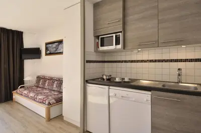 Cuisine ou kitchenette dans l'établissement Résidence Andromede - Appartement lumineux · Accès direct aux pistes · Vue pistes MAE-3577