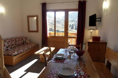 Coin salon dans l'établissement Résidence Carene - Appartement tout confort avec mezzanine · Proche des pistes · Vue pistes MAE-3579