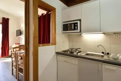 Cuisine ou kitchenette dans l'établissement Résidence Carene - Appartement tout confort avec mezzanine · Proche des pistes · Vue pistes MAE-3579