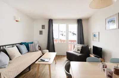 Coin salon dans l'établissement Résidence Carene - Appartement tout confort et agréable · Proche des pistes · Vue pistes MAE-3581