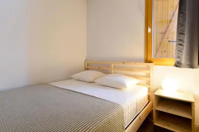 Un ou plusieurs lits dans un hébergement de l'établissement Résidence Carene - Appartement tout confort et agréable · Proche des pistes · Vue pistes MAE-3581